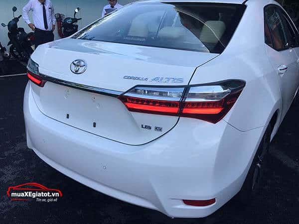 toyota_altis_1_8_g_cvt_2020_mau_trang_toyota_an_giang_duoi_xe_truc_dien